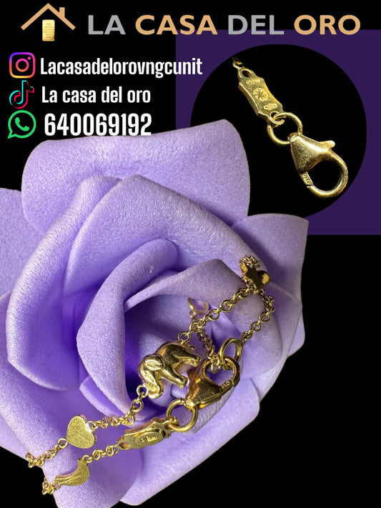 Pulsera figuritas de bebé oro 18 kt