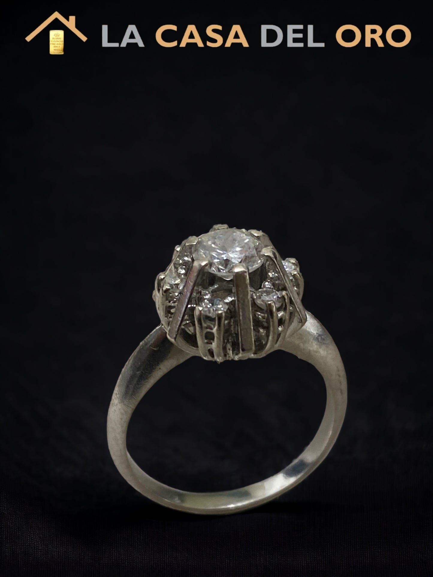 Rosetón 0.80ct oro blanco 18 kt