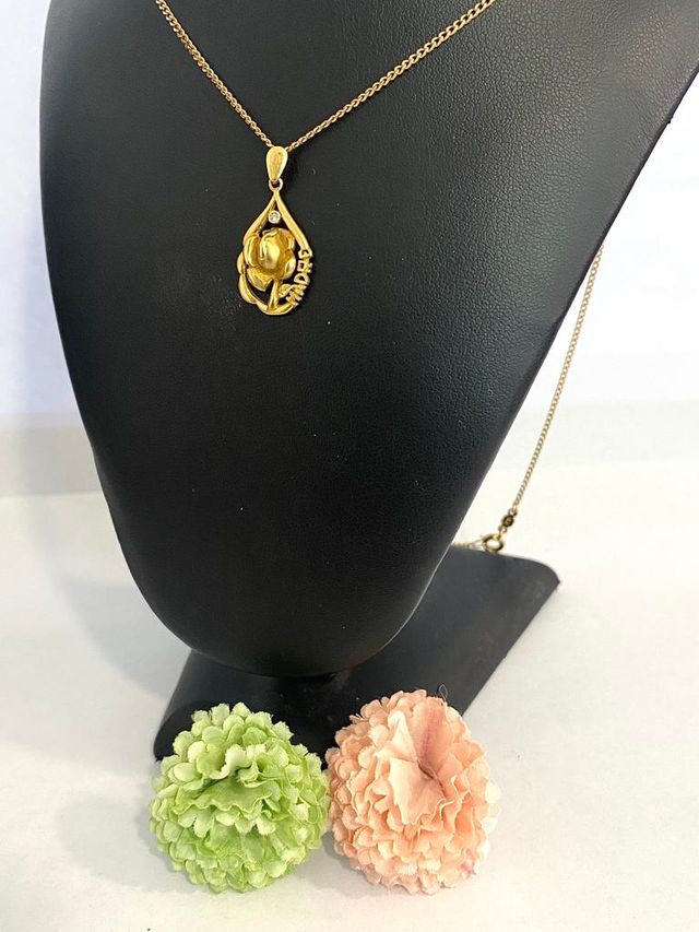 COLGANTE MADRE CON ROSA ORO DE 18KT